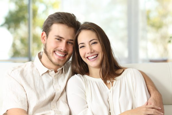 couple clicking a potrait