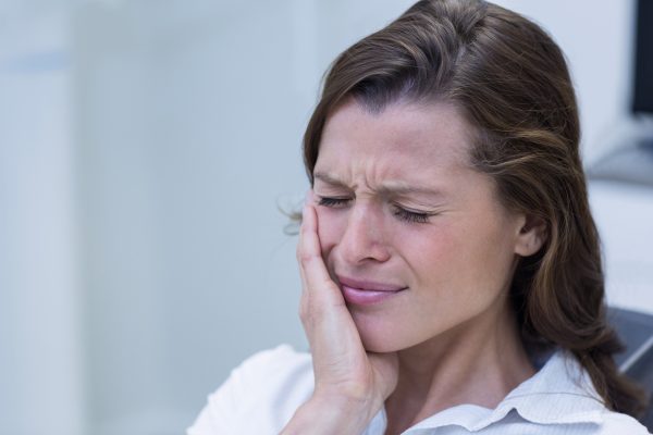 Women suffering from toothache