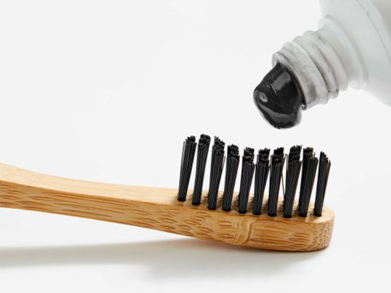 Bamboo Brush and black charcoal toothpaste