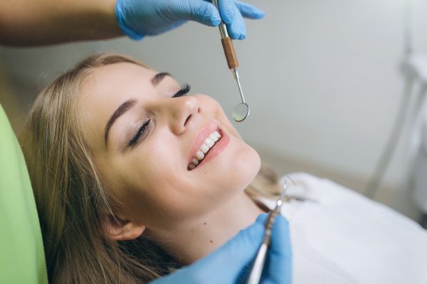 Women is having a dental checkup
