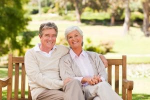 old couple sitting and smiling