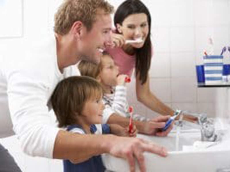 Family brushing teeth