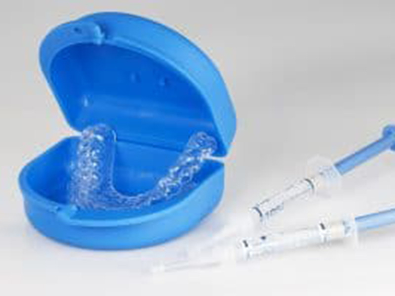 dental braces in a box and injections near it