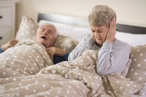 old couple suffering from snore