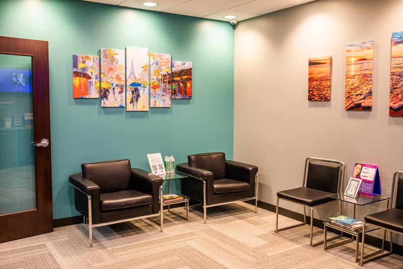 Waiting room inside Cosmetic and Implant Dentistry of Kansas City